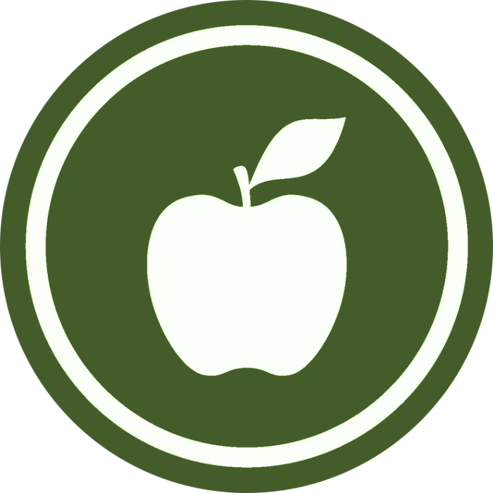 A graphic icon representing a vegetarian option, featuring a white apple silhouette inside a deep green circle framed by a white ring.